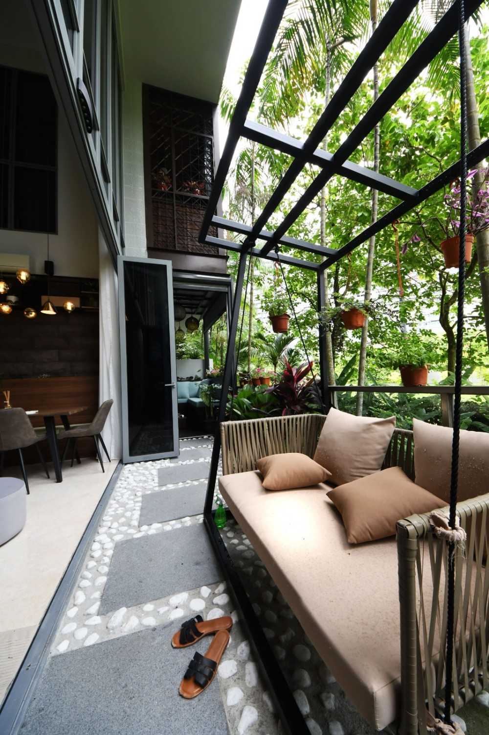 Contemporary Balcony with Outdoor Chairs and Houseplants