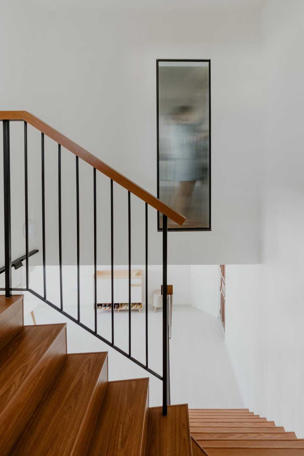Modern Bedroom with Vinyl Flooring and Staircase