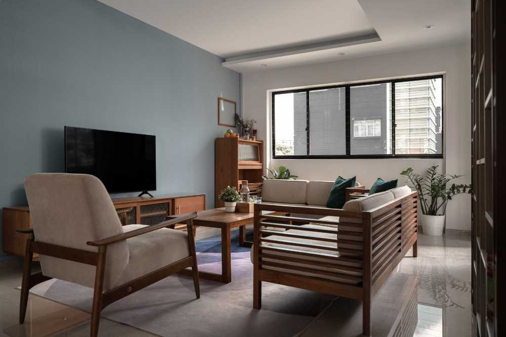 Modern Living Room with Bookshelf and Marble Floor