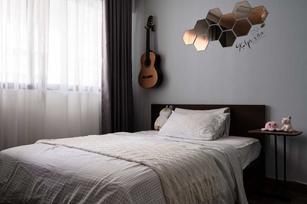 Modern Bedroom with Bedside Table and Children's Beds