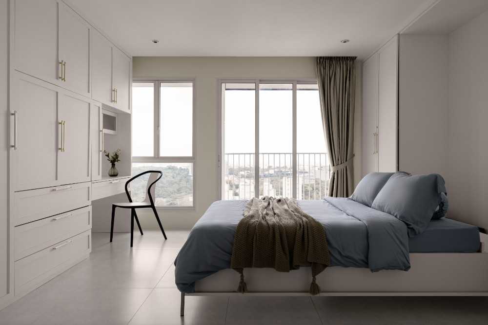 Transitional Bedroom with Bookshelf and Ceiling Light