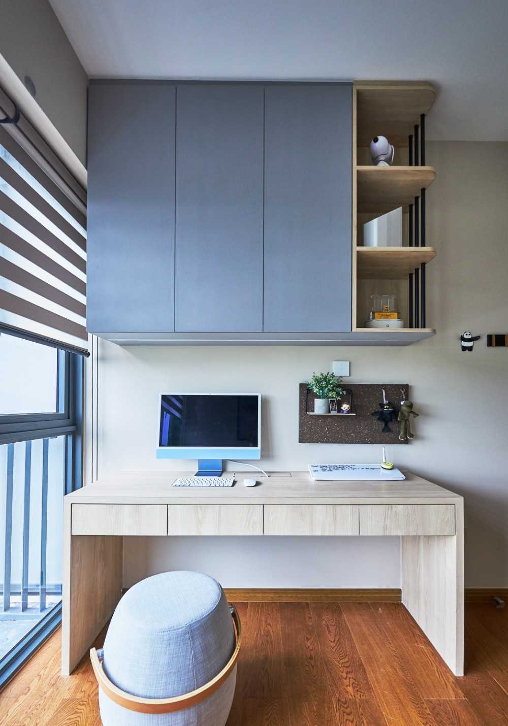Modern Home Office with Bookshelf and Storage Cabinets