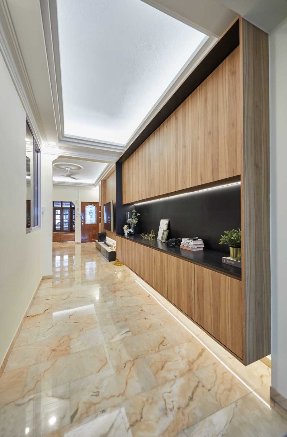 Transitional Foyer with Artwork and Planters