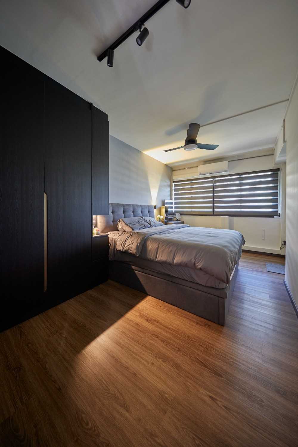 Contemporary Bedroom with Wood Flooring and Wardrobe