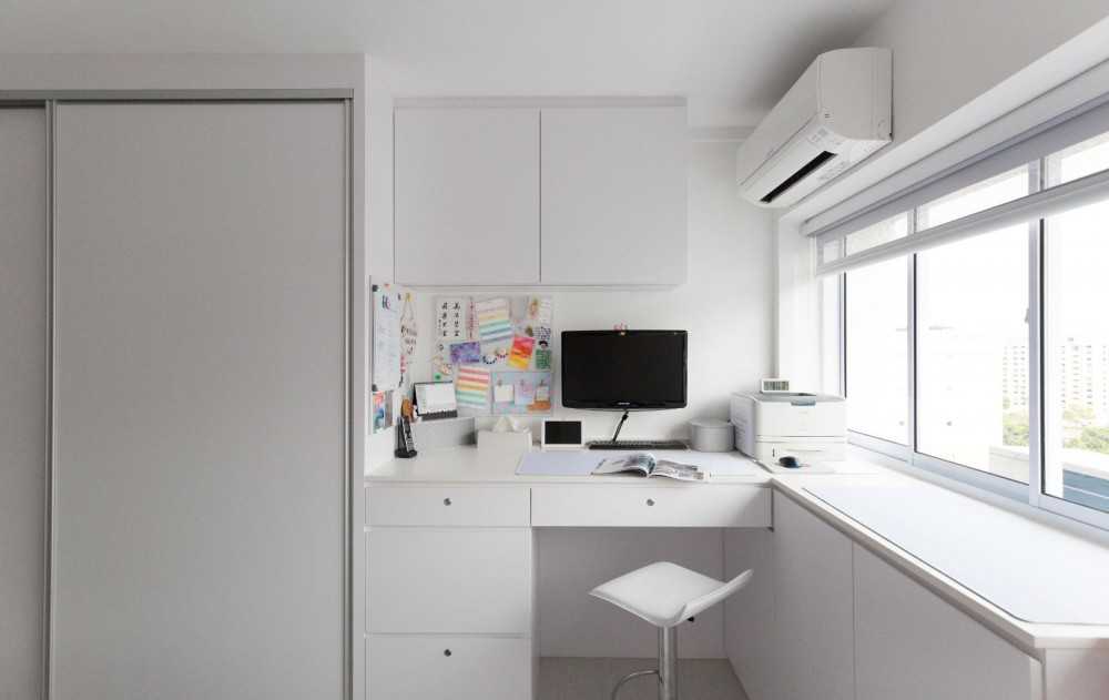 Minimalist Bedroom with Bookshelf and Drop Light