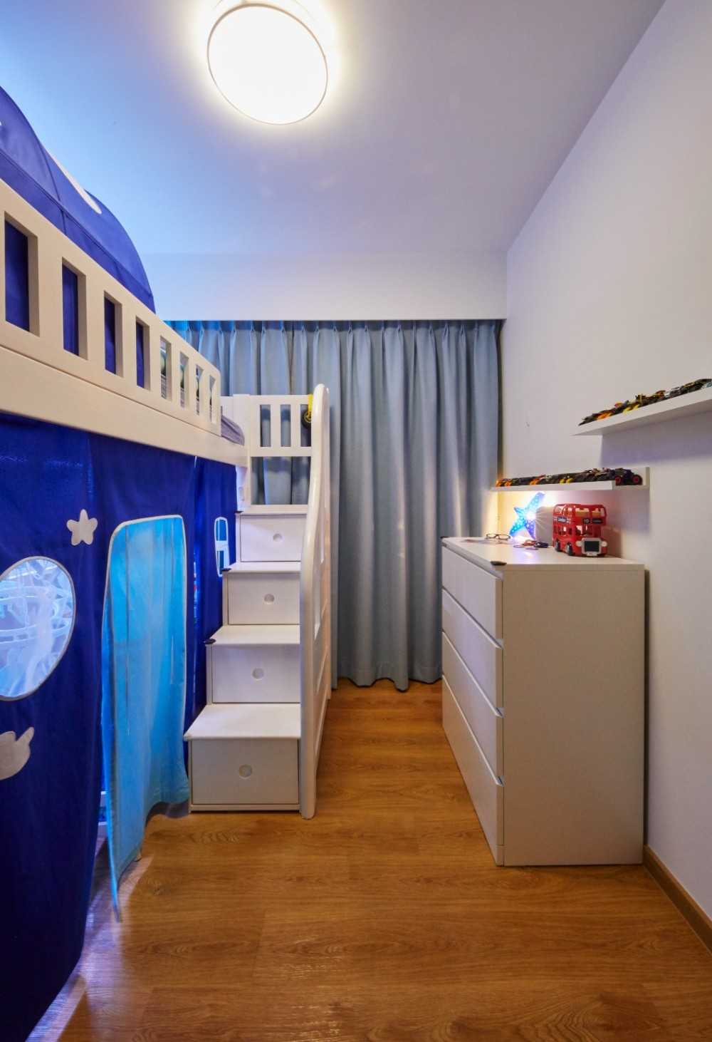 Contemporary Bedroom with Bookshelf and Children's Beds