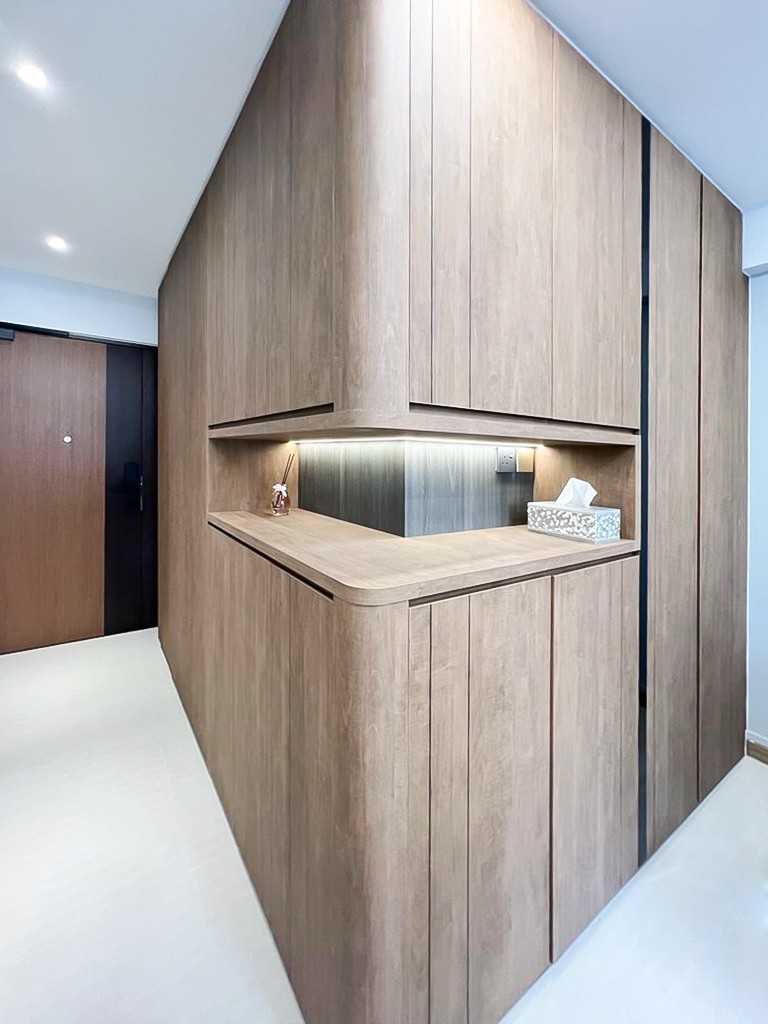Scandinavian Foyer with Paintings and Storage Cabinets