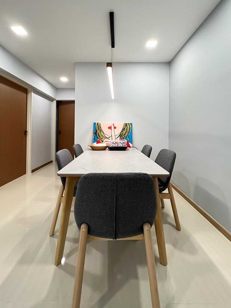 Scandinavian Dining Room with Dining Table and Paintings