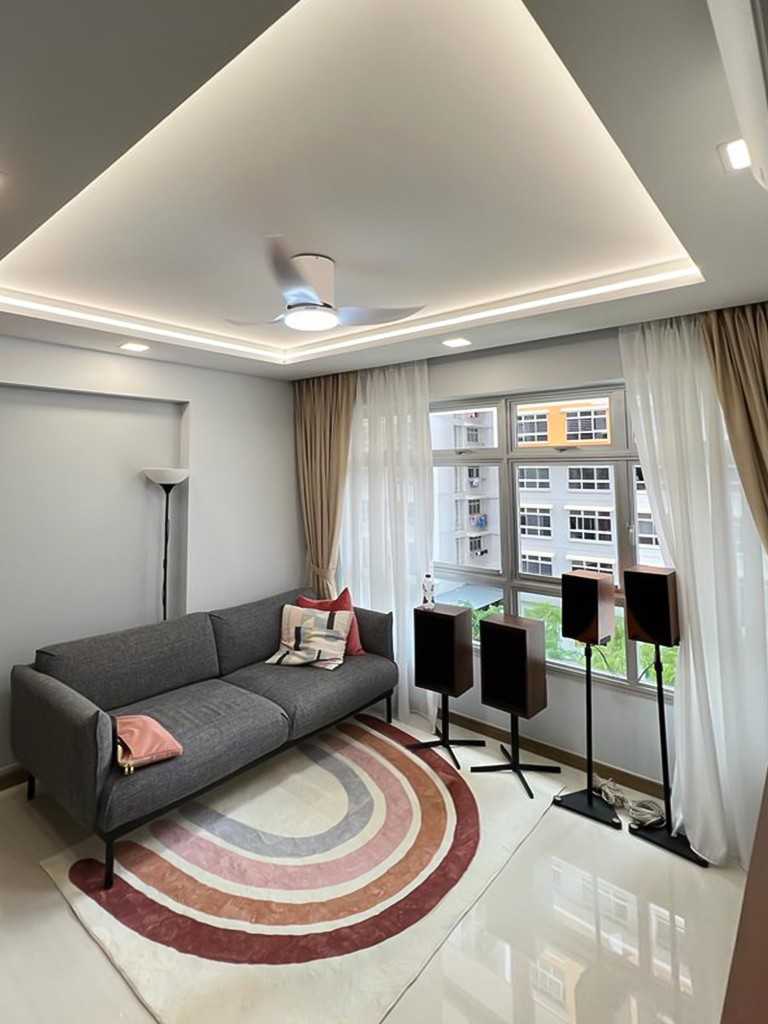 Scandinavian Living Room with TV Console and Window Grille
