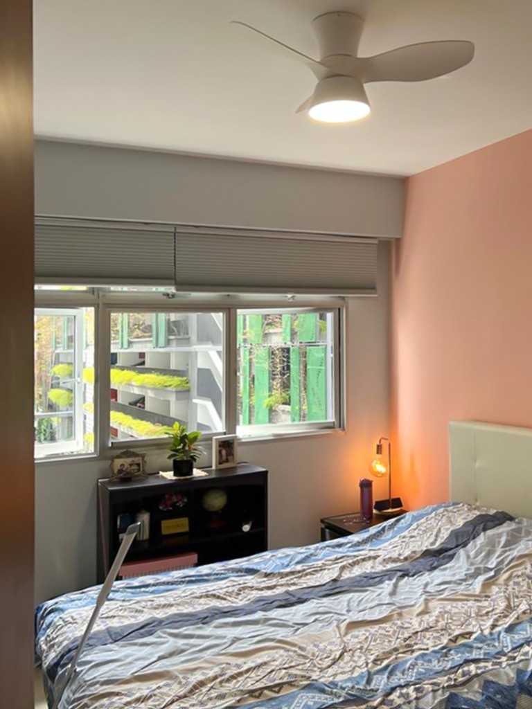 Scandinavian Bedroom with Window Grille and Paintings