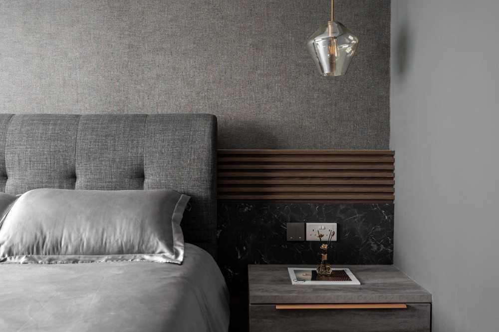 Contemporary Bedroom with Cove Lighting and Bedside Table