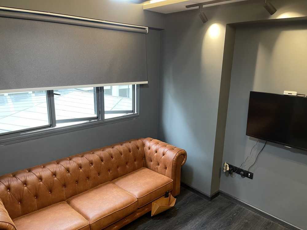 Industrial Bedroom with Vinyl Flooring and Drop Ceiling