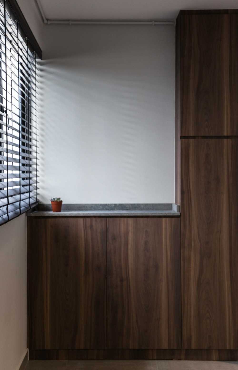 Contemporary Entryway with Shoe Rack and Storage Cabinets