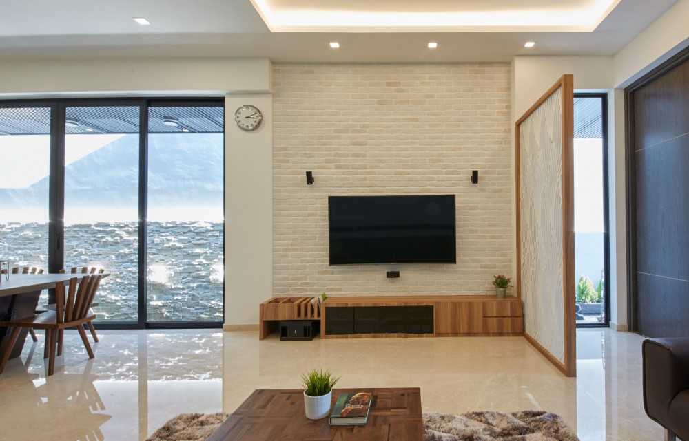 Asian Living Room with TV Console and Feature Wall