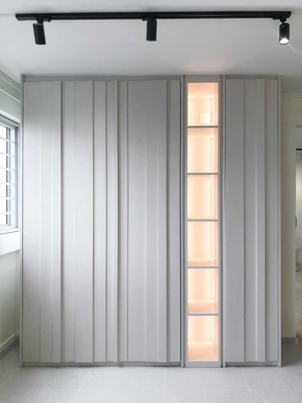 Scandinavian Foyer with Paintings and Storage Cabinets