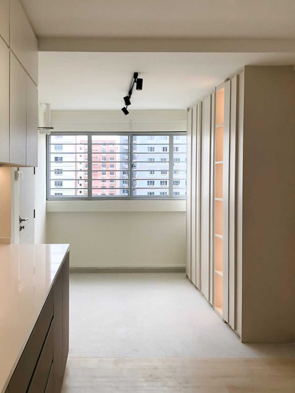 Scandinavian Foyer with Window Grille and Storage Cabinets