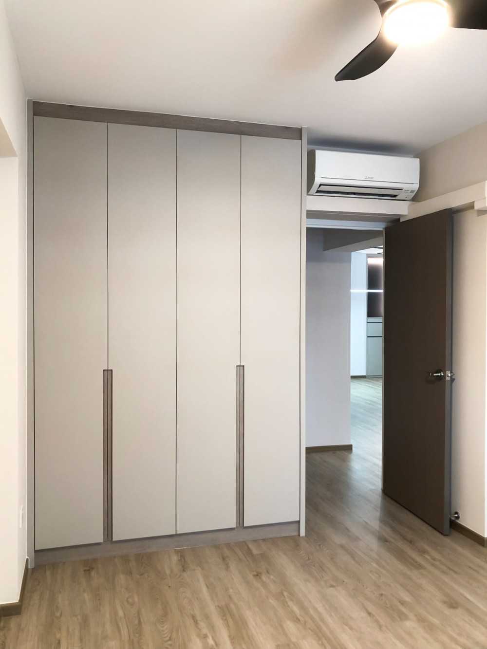 Scandinavian Bedroom with Wardrobe and Paintings