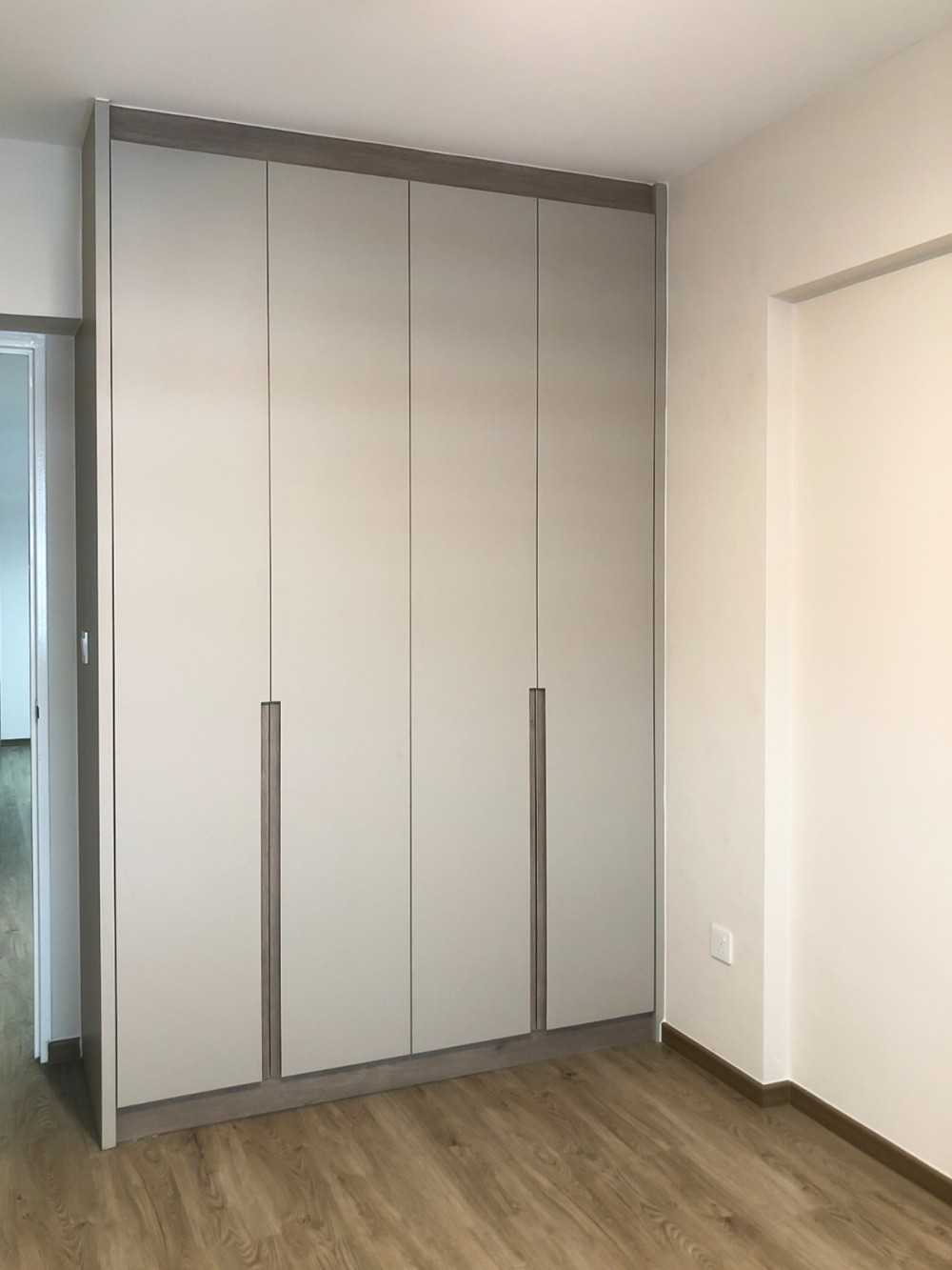 Scandinavian Bedroom with Wardrobe and Paintings