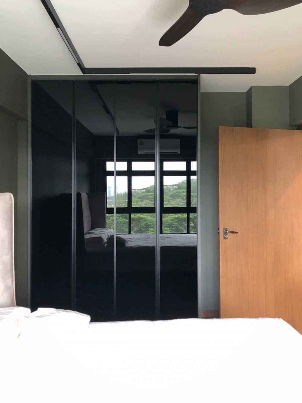 Modern Bedroom with Wardrobe and Paintings