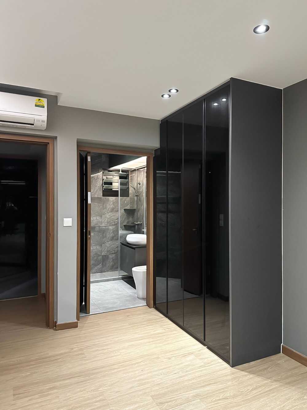 Modern Bedroom with Wardrobe and Paintings