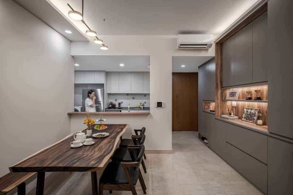 Contemporary Dining Room with Cove Lighting and Drop Ceiling