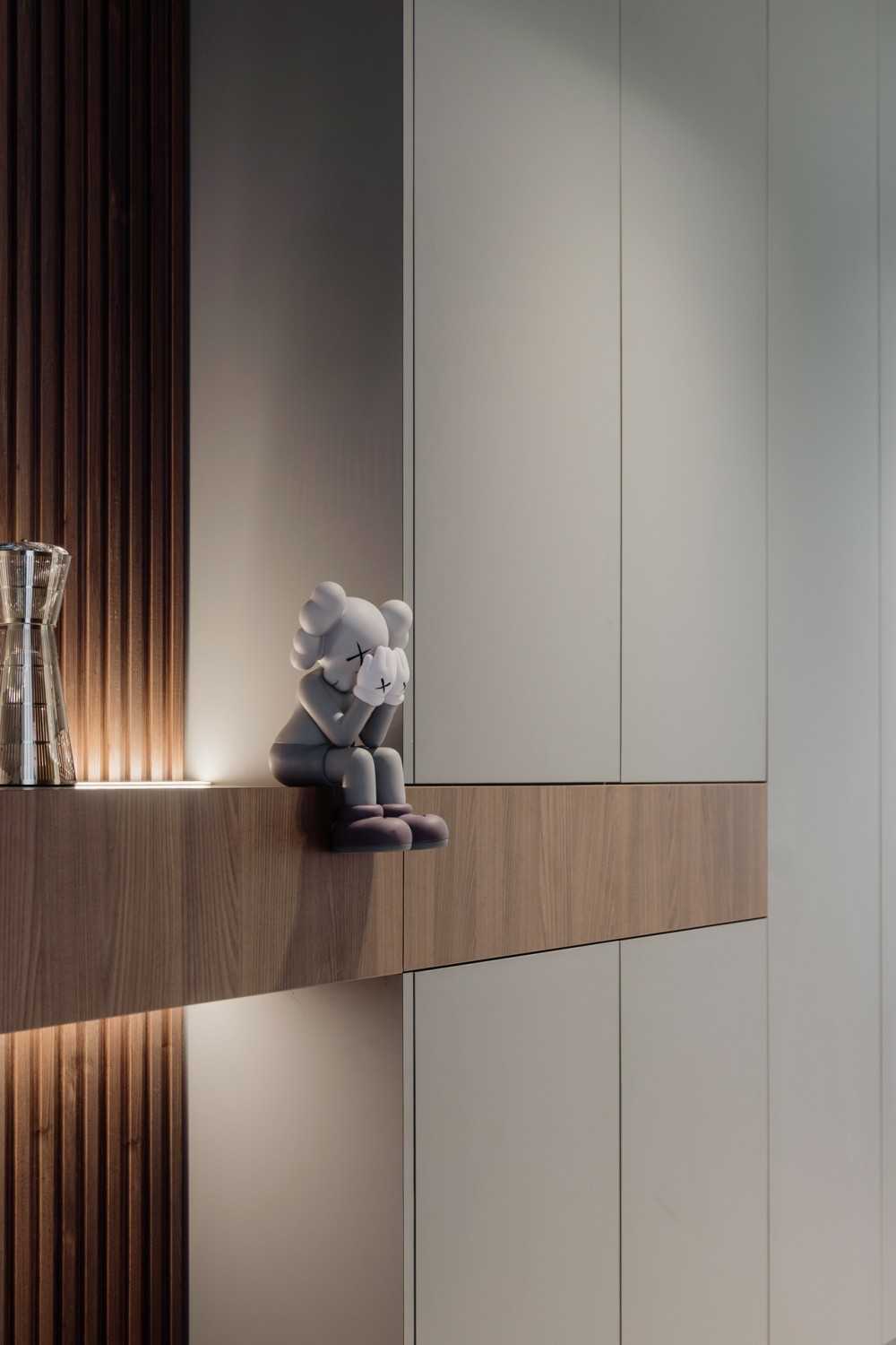 Modern Entryway with Feature Wall and Storage Cabinets
