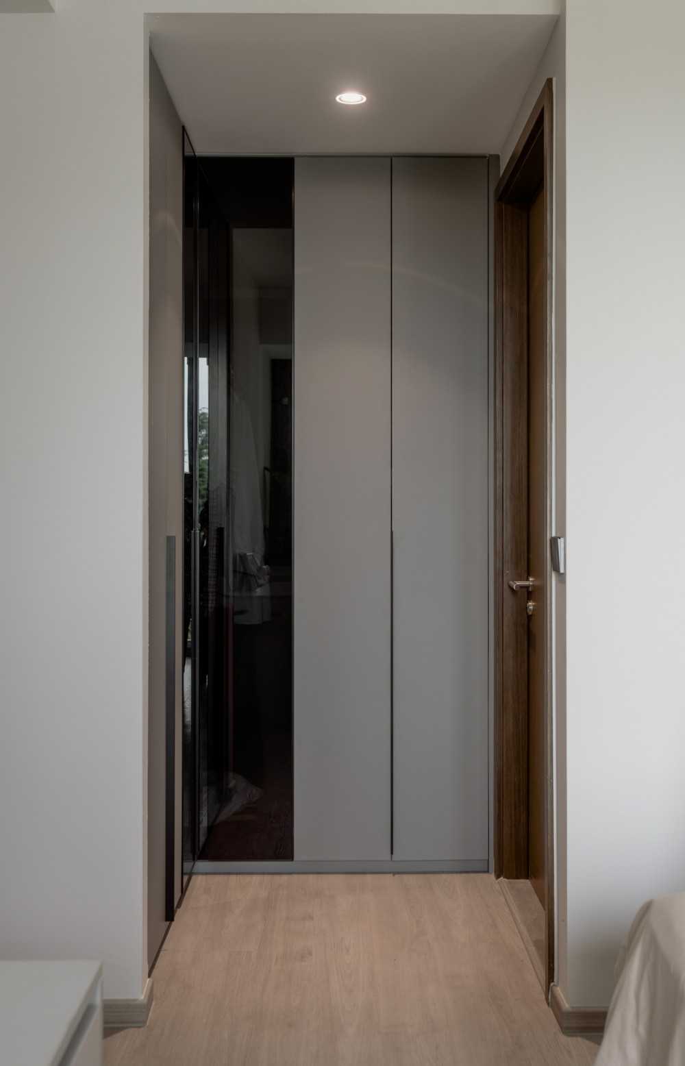 Modern Bedroom with Vinyl Flooring and Storage Cabinets