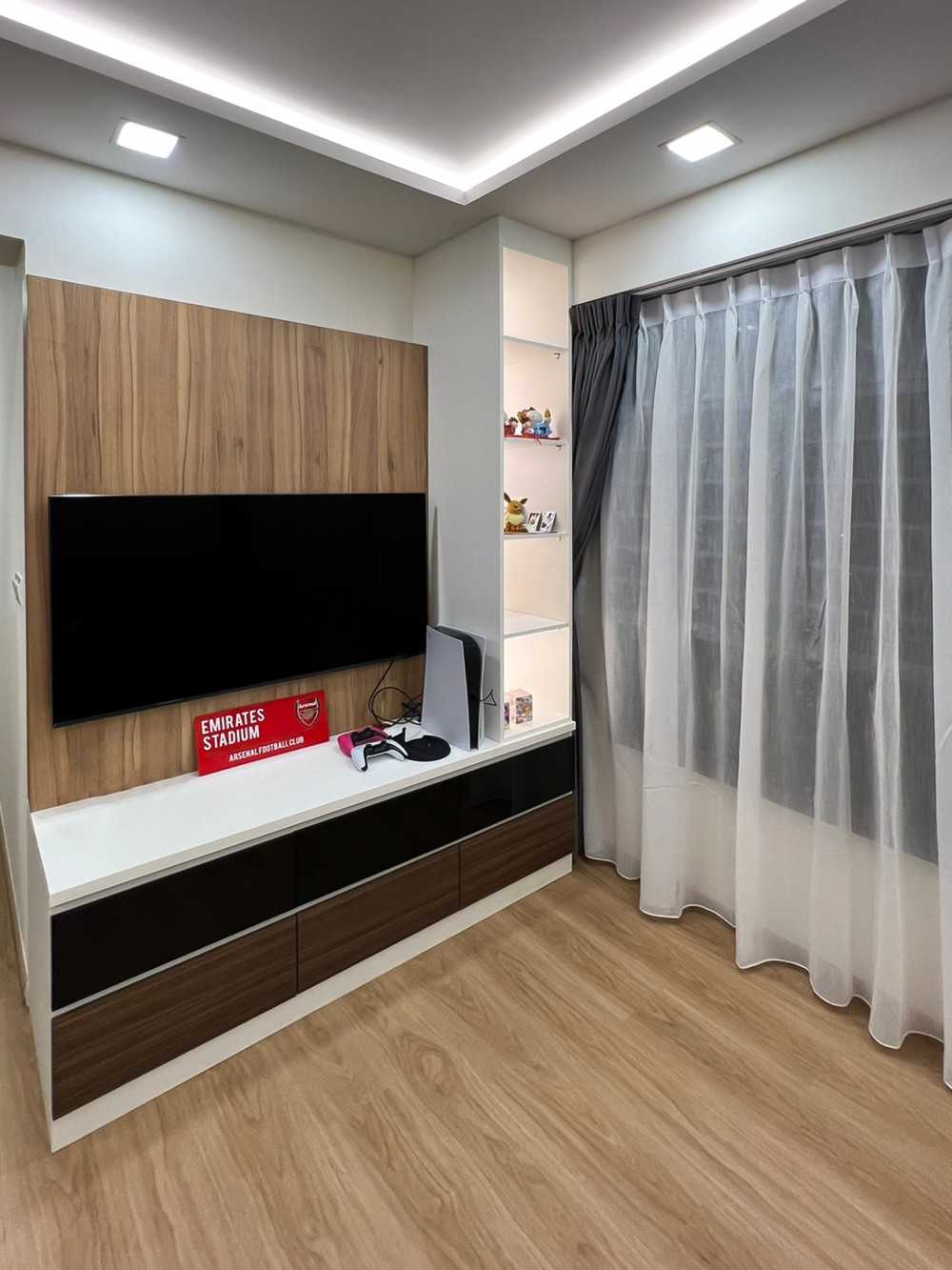Scandinavian Living Room with TV Console and Paintings