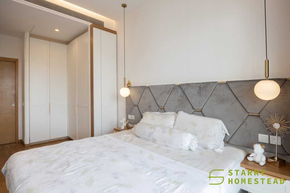 Scandinavian Bedroom with Wood Flooring and Drop Light