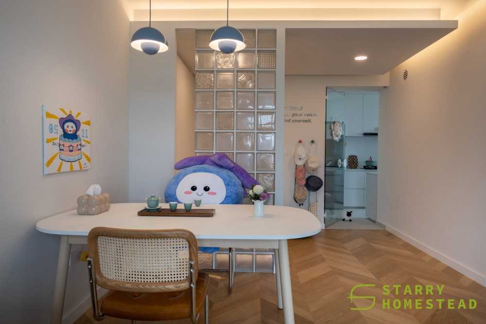 Minimalist Dining Room with Drop Light and Flooring