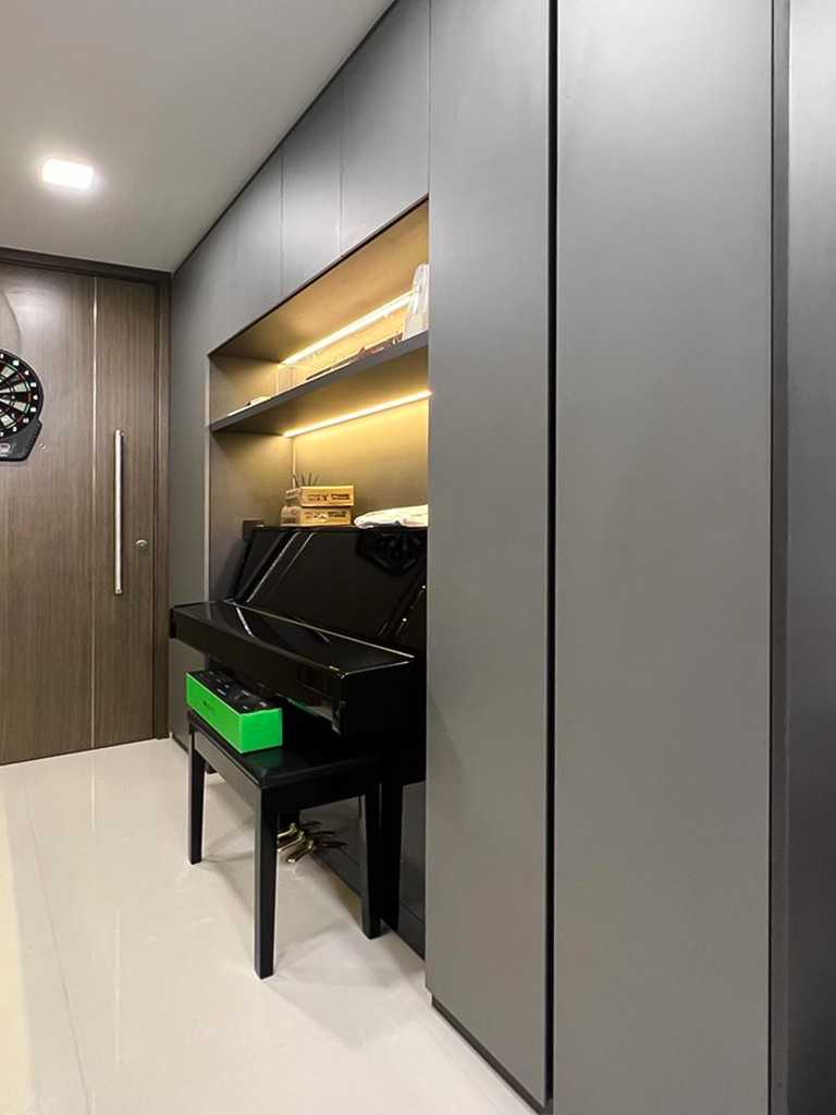 Scandinavian Foyer with Paintings and Storage Cabinets