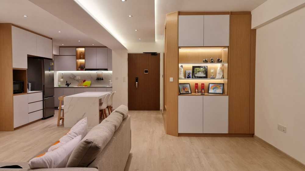 Modern Living Room with Kitchen Island and Cove Lighting