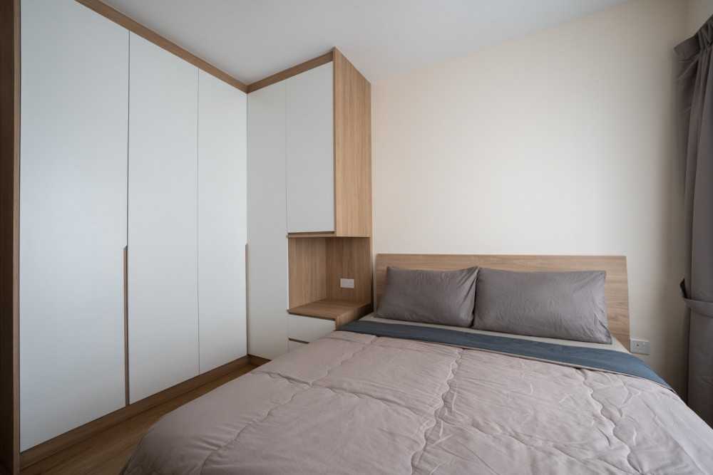 Scandinavian Bedroom with Wood Flooring and Ceiling Light
