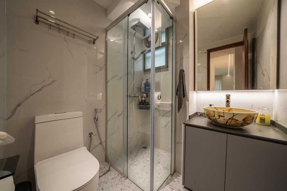 Asian Bathroom with Homogeneous Tiles and Mirror
