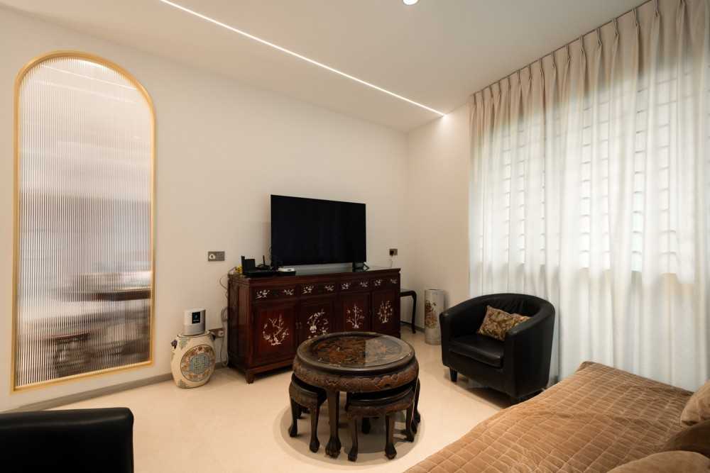 Asian Living Room with Wood Flooring and TV Console