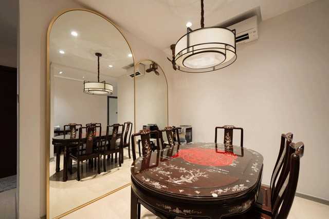 Asian Dining Room with Ceiling Light and Dining Table