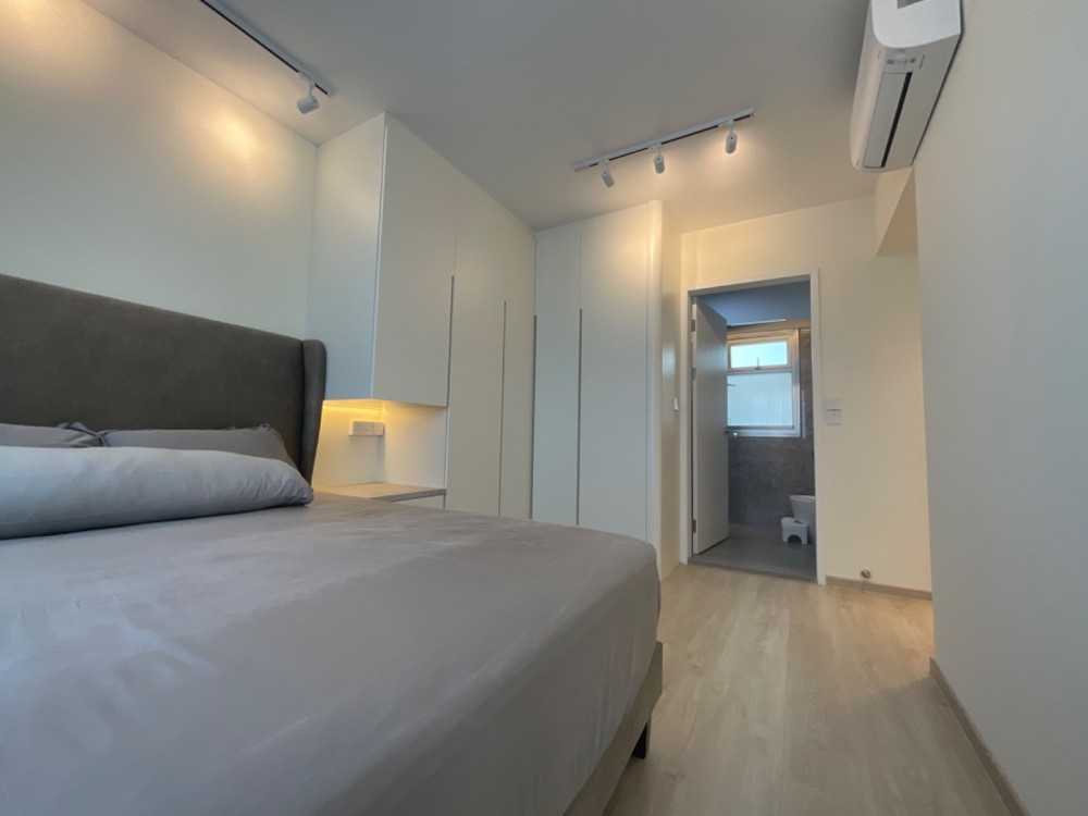 Minimalist Bedroom with Vinyl Flooring and Wardrobe
