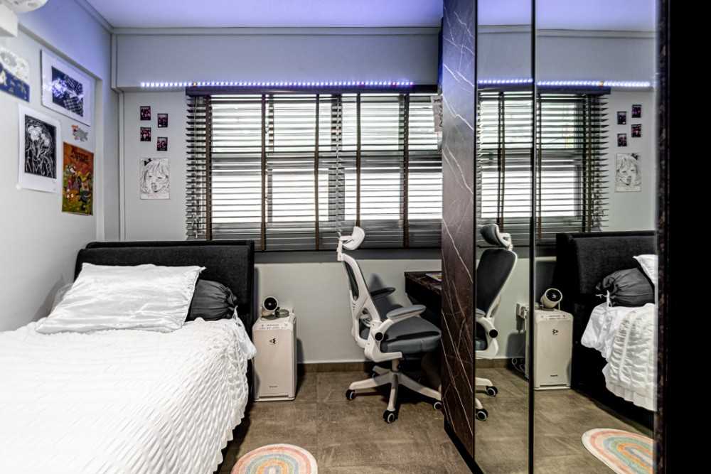 Contemporary Bedroom with Bookshelf and Ceiling Light