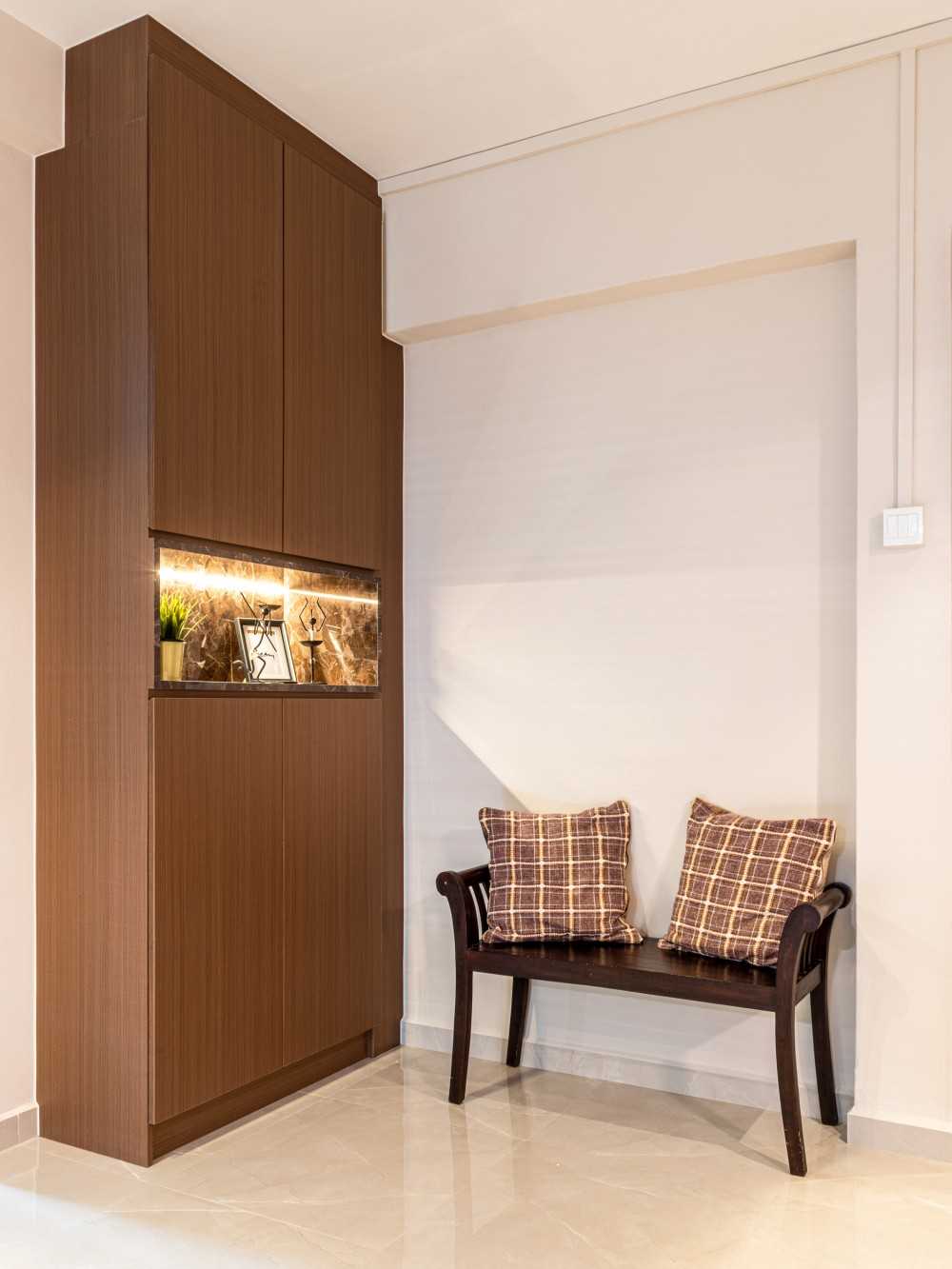Modern Entryway with Seating Bench and Storage Cabinets