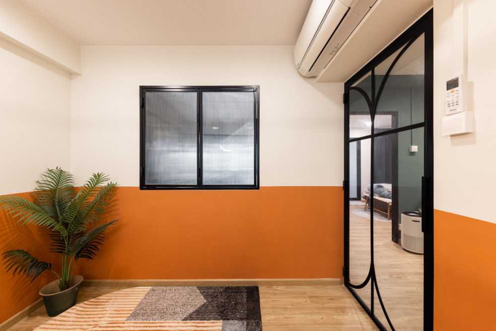Scandinavian Dining Room with Feature Wall and Kitchen Window
