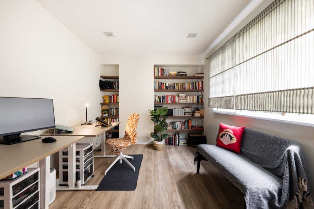 Scandinavian Study with Bookshelf and Curtain