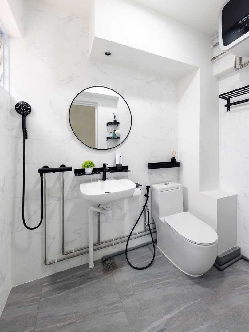 Scandinavian Bathroom with Homogeneous Tiles and Mirror