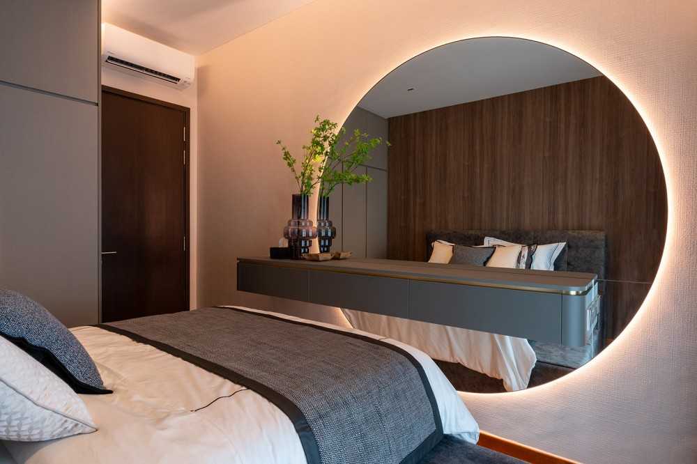 Minimalist Bedroom with Wood Flooring and Mirror