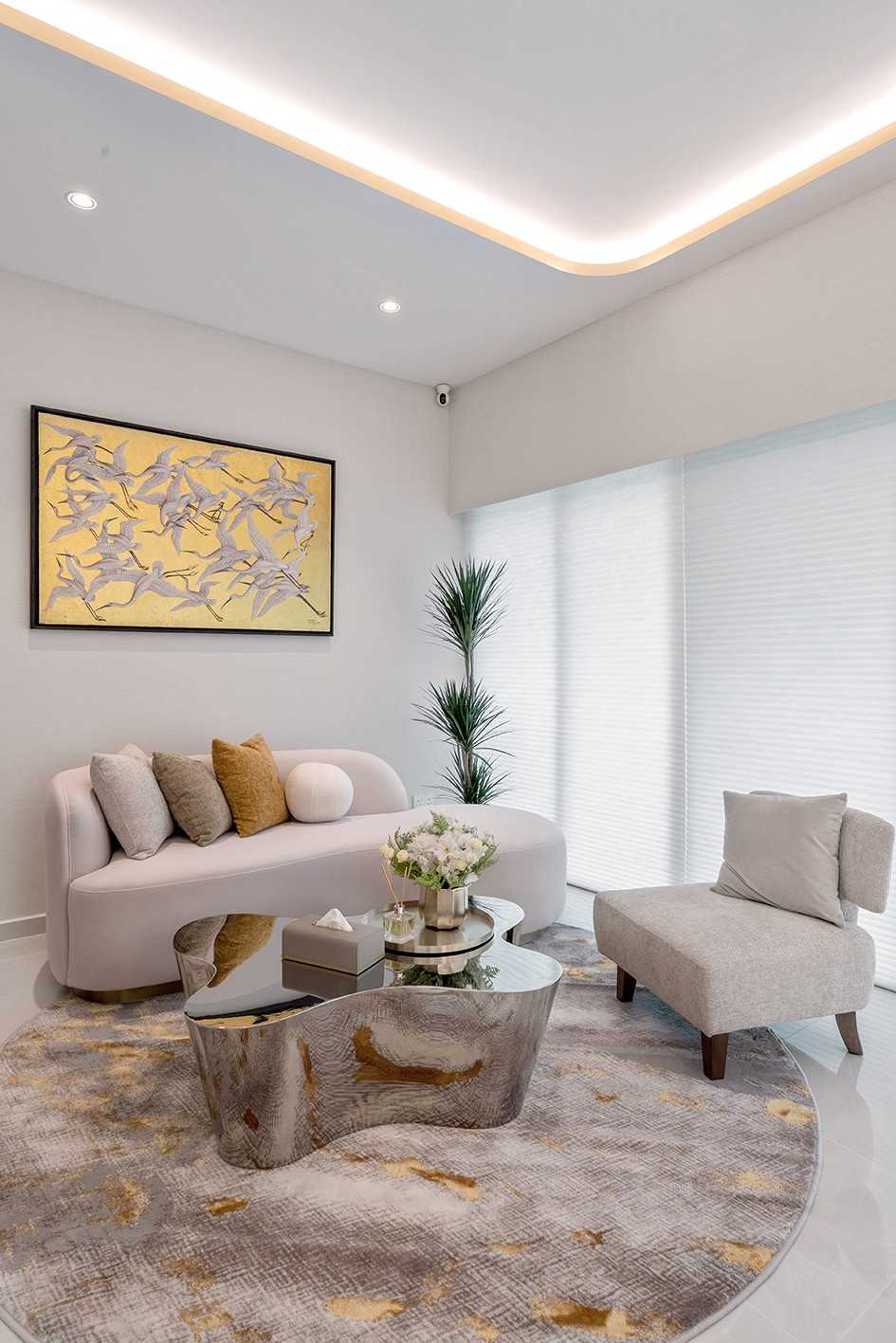 Minimalist Living Room with Cove Lighting and Drop Ceiling