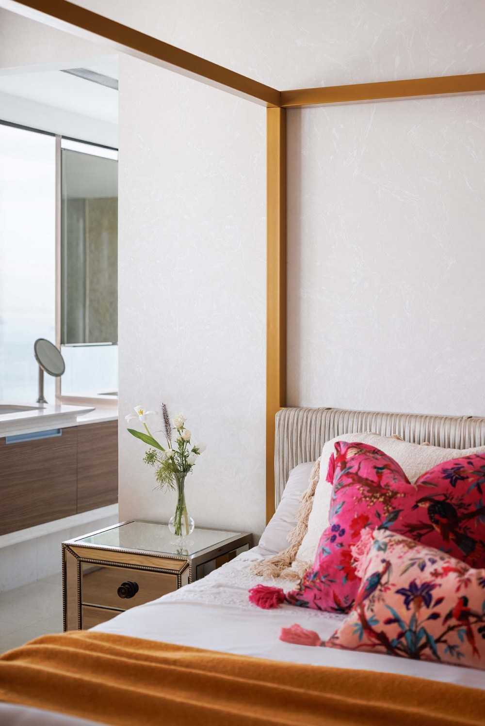Contemporary Bedroom with Cove Lighting and Wardrobe