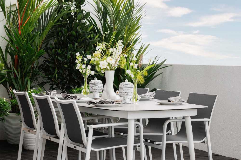 Contemporary Balcony with Outdoor Table and Outdoor Chairs