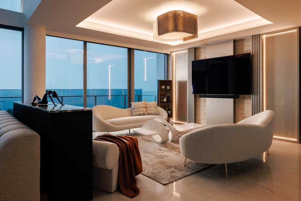 Contemporary Living Room with Feature Wall and Cove Lighting