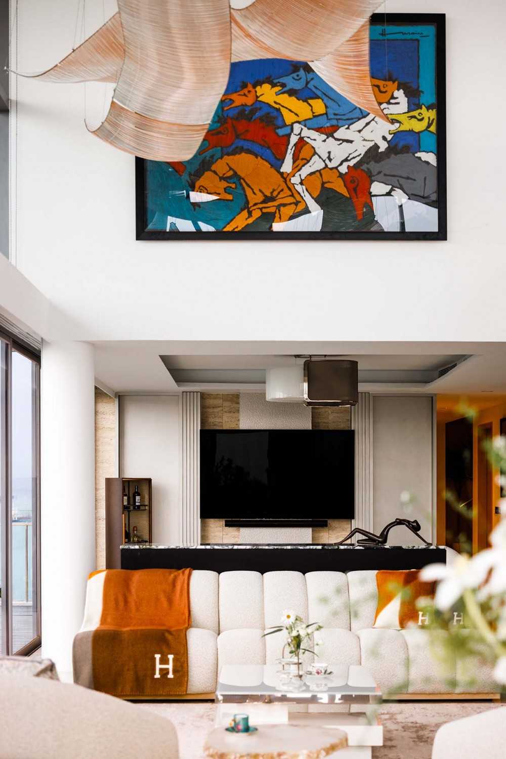 Contemporary Living Room with Cove Lighting and Sofa