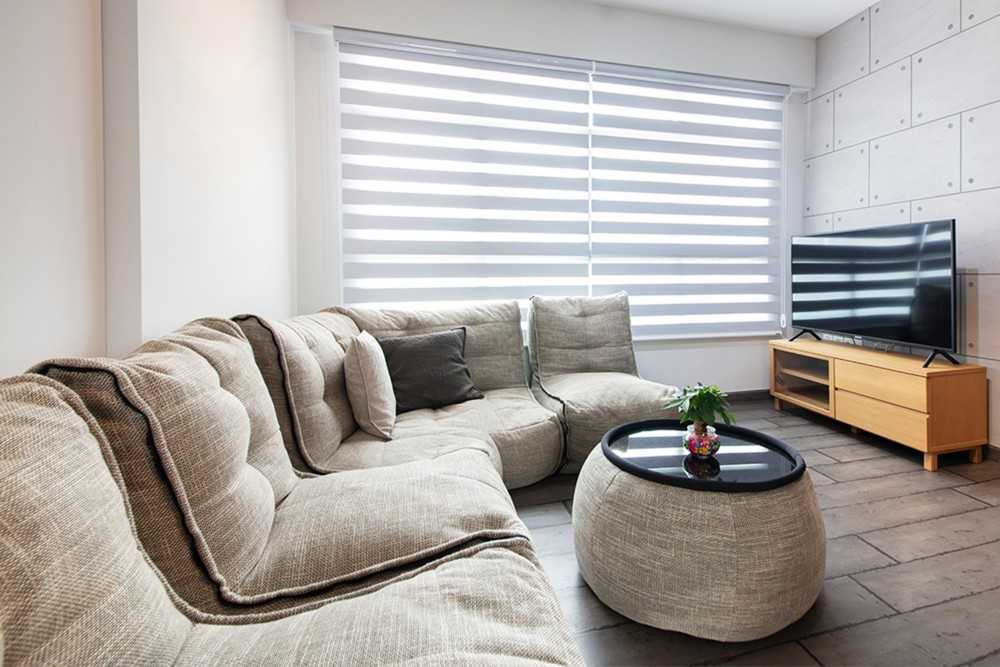 Industrial Living Room with TV Console and Feature Wall