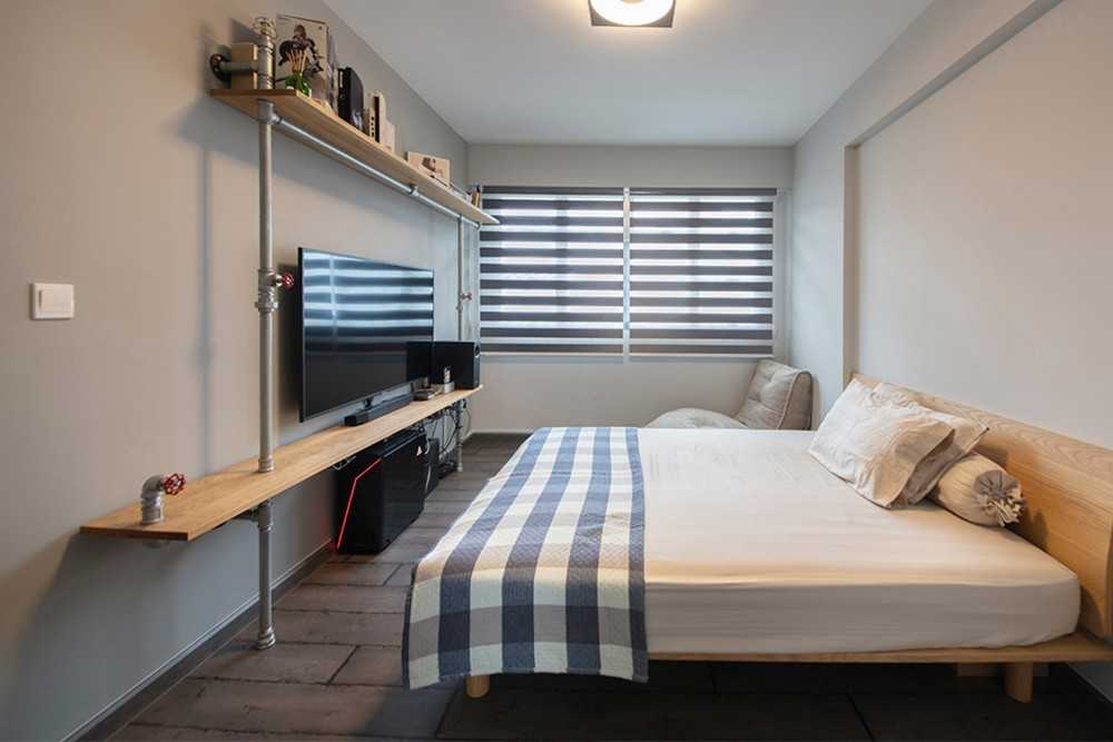 Industrial Bedroom with TV Console and Feature Wall